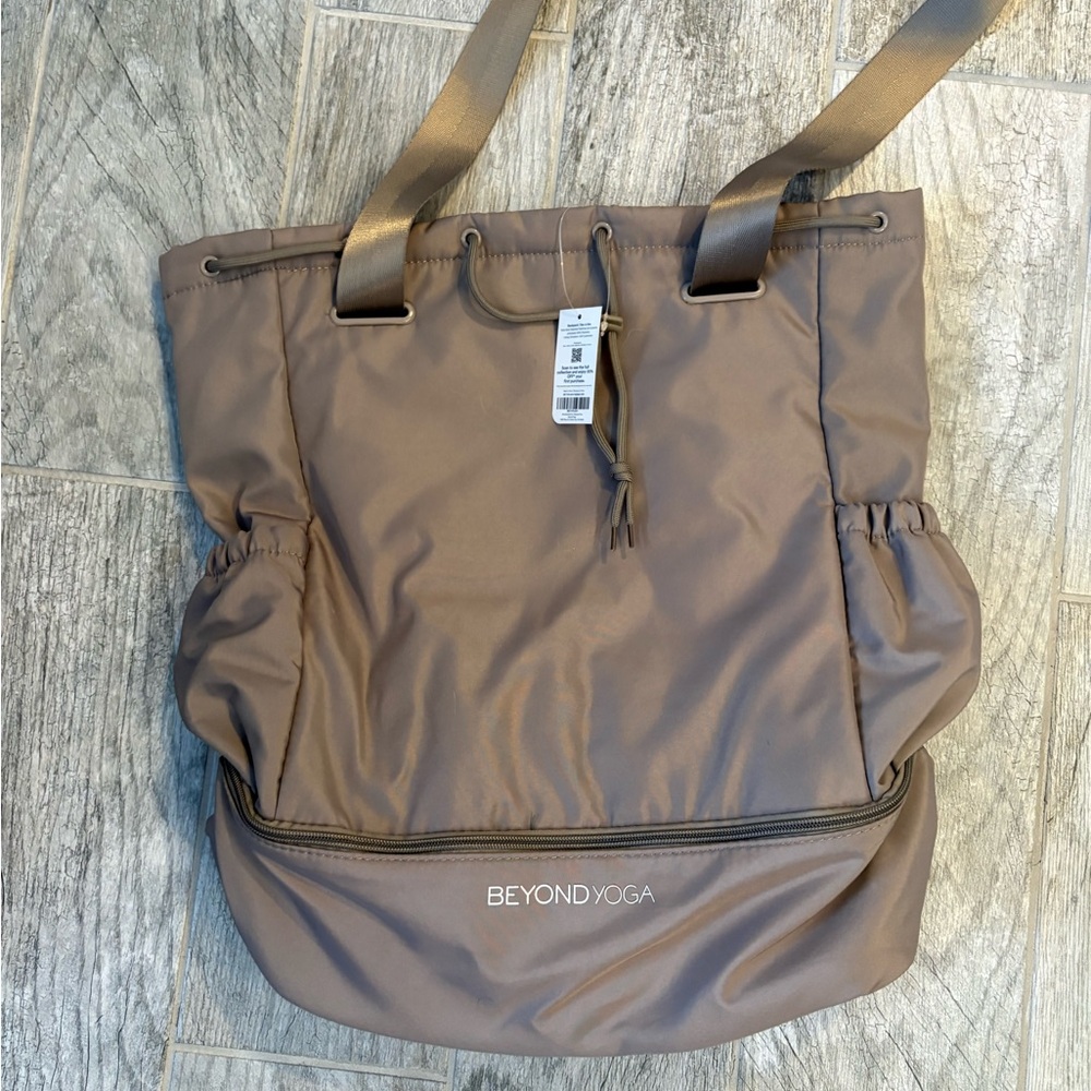 Beyond Yoga Tan Duffel Bag